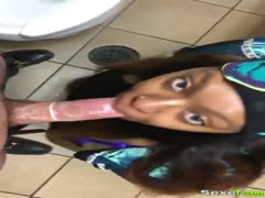 Sucking cock in a public restroom by an ebony, sultry wife